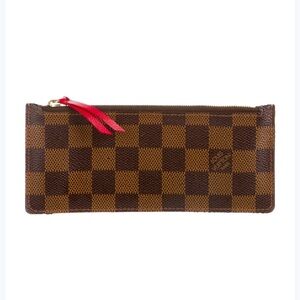 LV Josephine Wallet insert . In pristine condition . Authentic